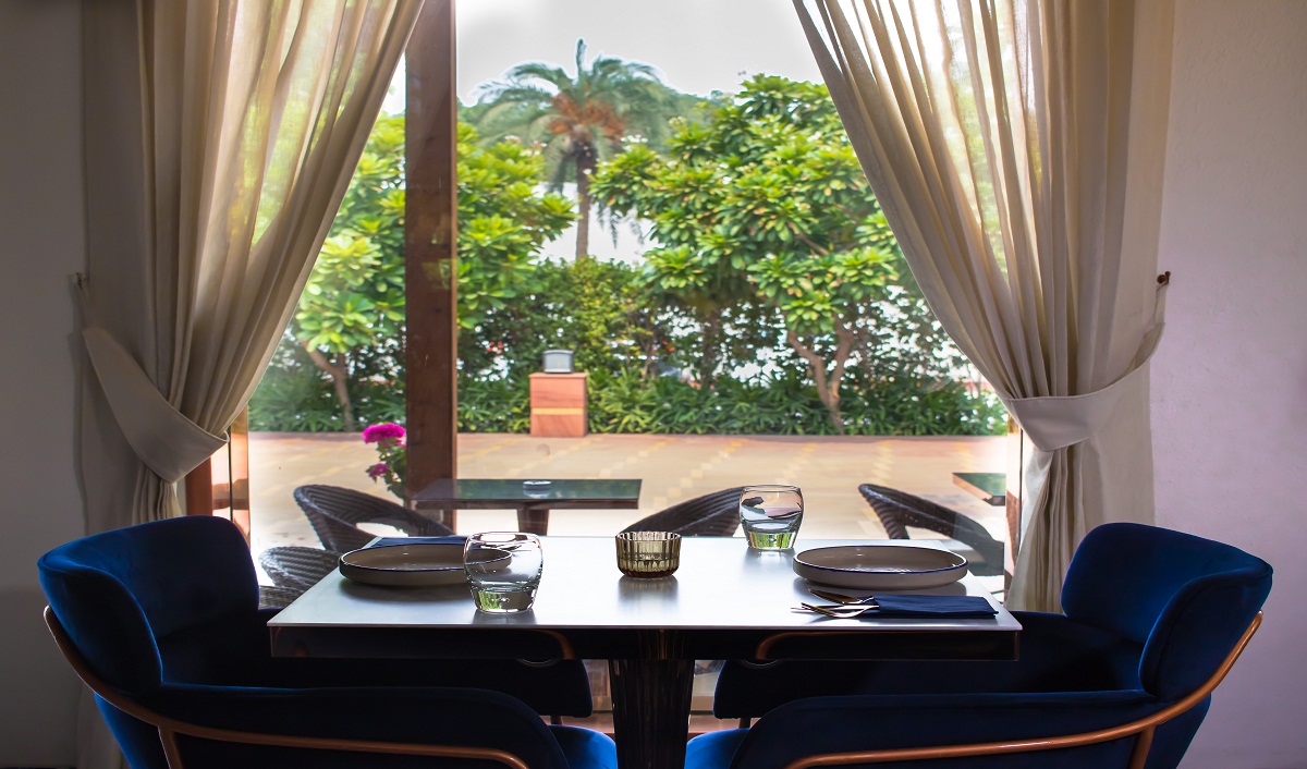 Head to this restaurant for a delectable experience along with a magnificent view of Qutub