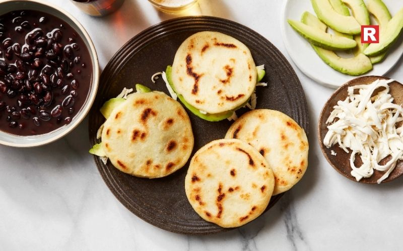 7. Arepas with Toppings (Venezuela & Colombia)